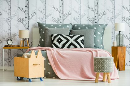 Decorative pillow in feminine bedroom