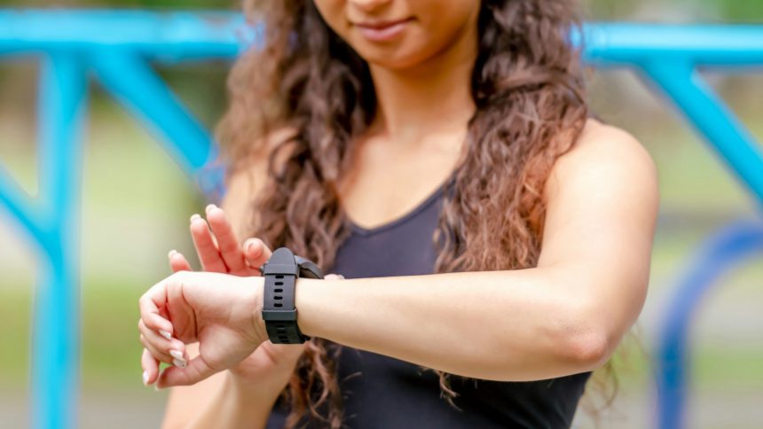 Girl with fitness tracker